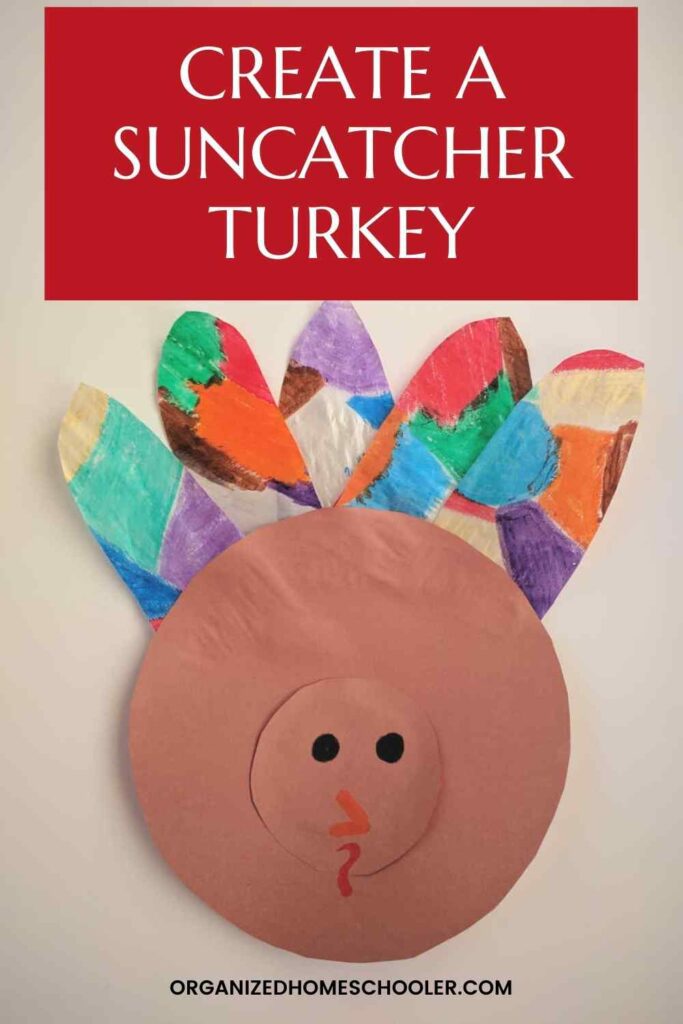 create a suncatcher turkey written over a turkey craft with construction paper and Kwik Stix paint sticks